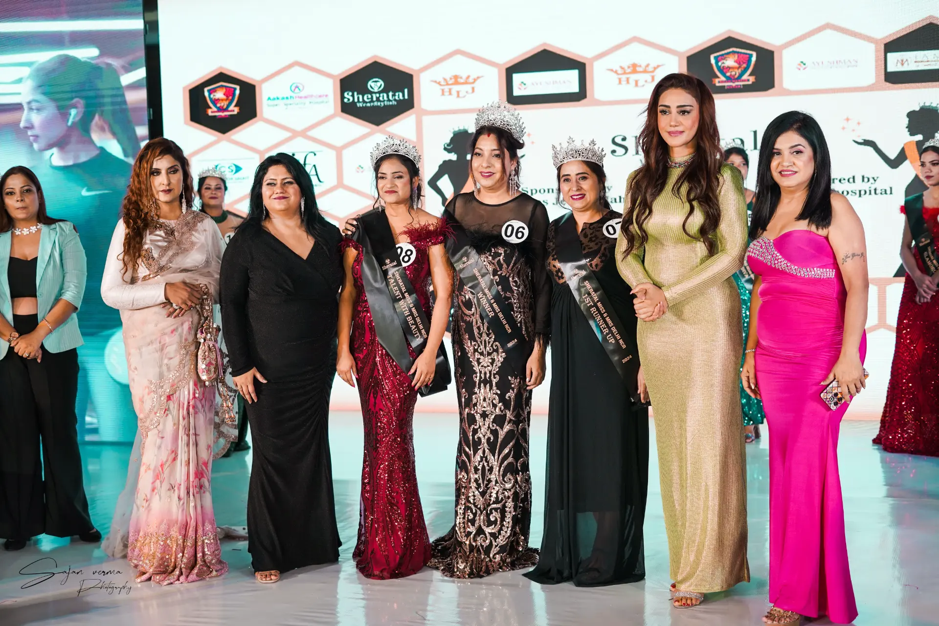 SHERATAL pageant winners and guests on stage